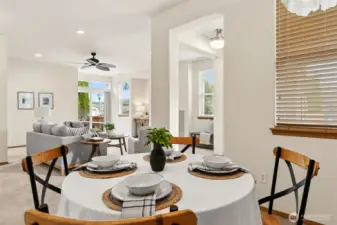 Dining are is open to living room and kitchen spaces