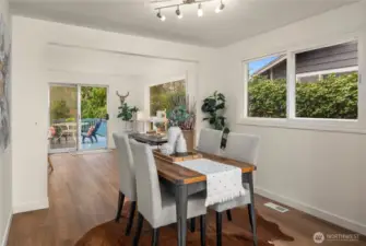 The width of this large dining room allows for extra dining room furniture such as a hutch or buffet.