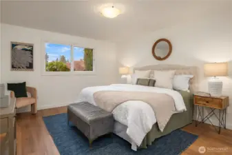 The primary suite is one of 3 bedrooms on the main level and features a private 3/4 bath.