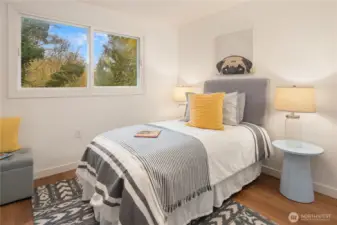 The third bedroom is in addition to the fourth bedroom in the ADU over the garage.