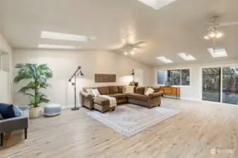 HUGE second living space with sliding doors leading to the outdoors...6 skylights allowing for ample natural lighting!