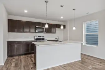 Photos are from the Lina model home in prior community. Finishes, upgrades, and features will vary.