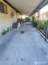 Long carport with room for multi cars/trucks/boat/trailer etc.