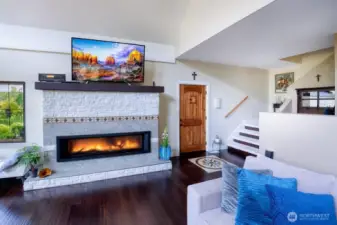 Gas fireplace adds warmth and elegance, creating a marvelous focal point that enhances the entire space.