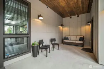 Another front porch seating area or perfect place to store skiing equipment after a long say on the slopes