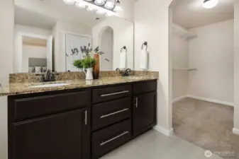 primary bath and oversized walk-in closet.