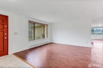 Living room with front entrance.