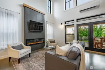 Electric fireplace is also plumed for natural gas if you desire a gas fireplace. The French door to the patio is an upgraded feature. Other homes have sliding doors.