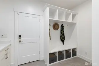 Laundry room heading out to 3 car garage.