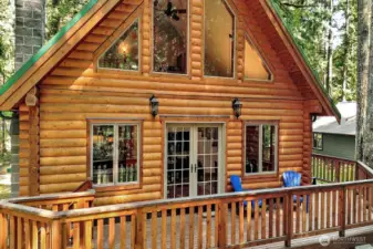 Windows and doors are of double glass high quality wood construction with Aluminum clad exterior profiles for maintenance free life and quality hardware including top and bottom locking pins for doors, operated by door handle.