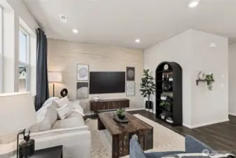 Great room space to relax. Actual home is under construction. Colors, materials, and features may vary. See site agent for details.