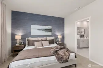 Primary bedroom 1 with connected primary bath. Actual home is under construction. Colors, materials, and features may vary. See site agent for details.