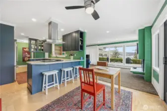 Additional eating space at kitchen counter is  necessary to engage with the "cook" and offer advice!