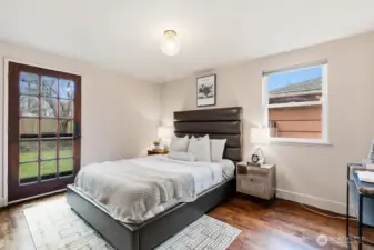 bedroom with access to backyard