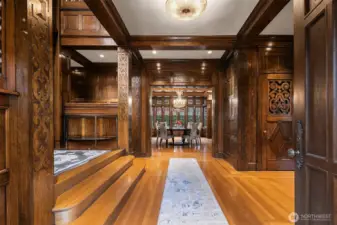 Hand carved Siberian Oak paneling graces the entry foyer, the dining room, the living room and the stairwell.
