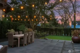 The patio area is surrounded by low maintenance gardens. A built-in sprinkler system is complete with a smart irrigation controller.