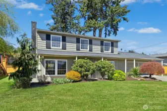 Beautifully updated home on shy quarter acre with partial lake & mountain views.