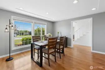 The living room is opposite the kitchen.