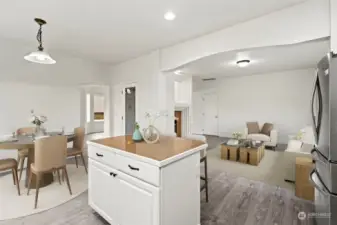 Virtually staged Kitchen and eat in area