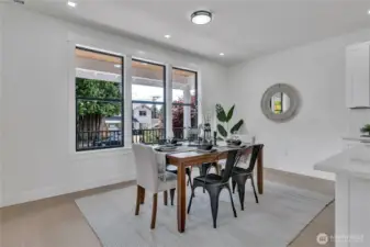 Formal dining off entry overlooking front patio