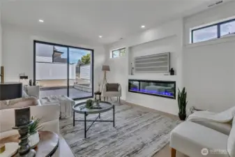 Spacious living room with slider to back patio