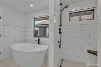 Primary soaking tub and private shower
