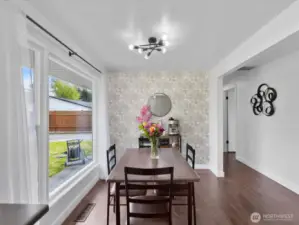 Light & bright dining room overlooking back yard
