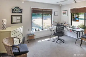 The second main level bedroom could be a flex space for your needs. With windows that face to the west and north - you have plenty of ambient natural light throughout the year.