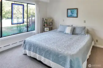 You may be in the daylight basement but the light from the windows gives you the feeling of being on the main level. One of two downstairs bedrooms.