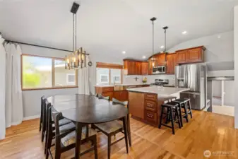 The updated Kitchen features a large island that is perfect for informal mealtimes, while the expansive dining area is available for larger or more formal settings. A great entertaining space!