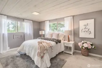 The upper level has two large bedrooms and a full bath! Bedroom #1 has a unique shiplap ceiling.