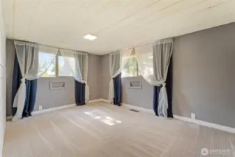 The upper level has two large bedrooms and a full bath! Bedroom #1 has a unique shiplap ceiling.