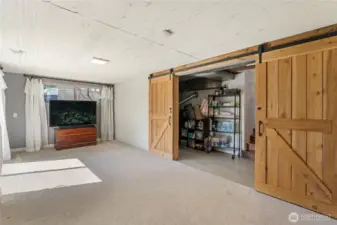 Flow through the pantry/laundry space barn doors to the great room downstairs...