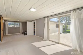 Opposite the bathroom is the large Primary Bedroom. The large slider opens to a gorgeous patio!