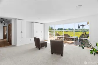 Family room is so bright with incredible lake views.
