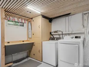 Laundry area located in basement