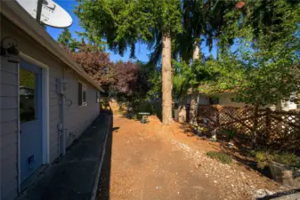 Easy outdoor access from garage to side yard.