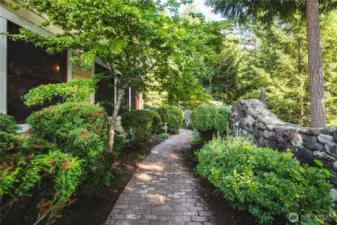 Fenced in yard with beautiful landscaping