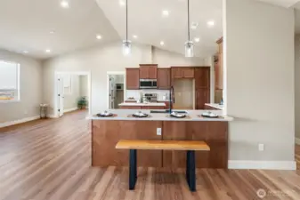 Peninsula Seating, door to left is Pantry, double doors to flex room