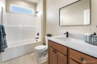 Full Hall Bath between Bedroom 1 and 2