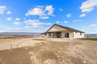 Perched on corner lot- views all around- and room for a pool and a shop if desired!