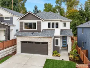 Built in 2022, this stunning PNW contemporary home in Echo Park sits on a prime lot with a two-car garage just a couple doors away from the community park.
