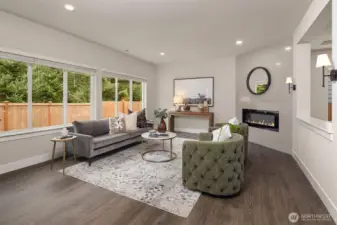 The living area is spacious and easily accommodates large-scale furnishings.