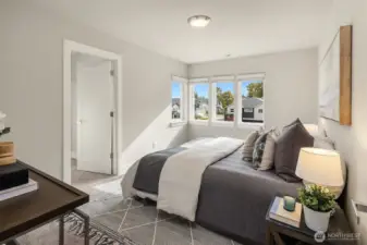 Bright, morning-lit bedroom easily accommodate a king bed.