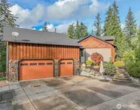 3 car Garage attached to the house, on the top floor of the garage there is unfinished space, you can finish and use as game room for the kids or sewing room, etc..., the east side of the house has a covered garage and above that garage there is a mezzanine for tools or storage etc...