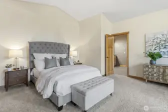 Primary suite has plenty of space for a king size bed and seating area.