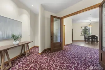 Lower level-Ready for a party !!! Large Wet bar with beer fridge/flat screen TV (conveys with property) ready for all your SEAHAWK parties!!  LIGHTS, READY, ACTION! Performance Stage with electrical for guitars, drums and speakers. Dance floor, bonus room for playing cards or board games, a non-conforming bedroom or office/den, expansive great room and covered patio with built-in BBQ kitchen for year around enjoyment.