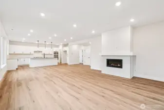 Gorgeous upgraded LVP flooring throughout main level and at stairwell and upper hallway