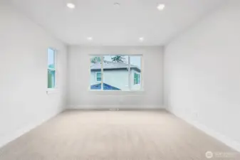 Primary bedroom offers plenty of space for oversized furniture and even room for added chairs or chaise for those quiet moments to read or reflect.