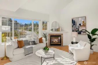 You’ll love the sunlight pouring through large windows, the open floor plan, double volume ceiling, and hardwood floor throughout!